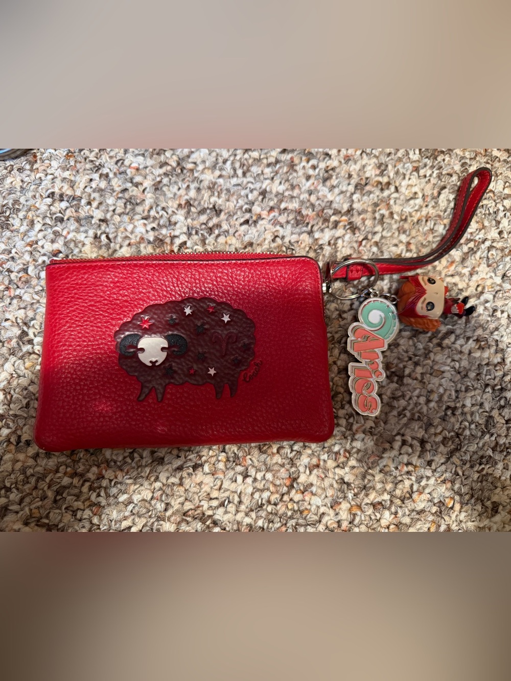 COACH Red Pebbled Leather Wristlet with ARIES Patch